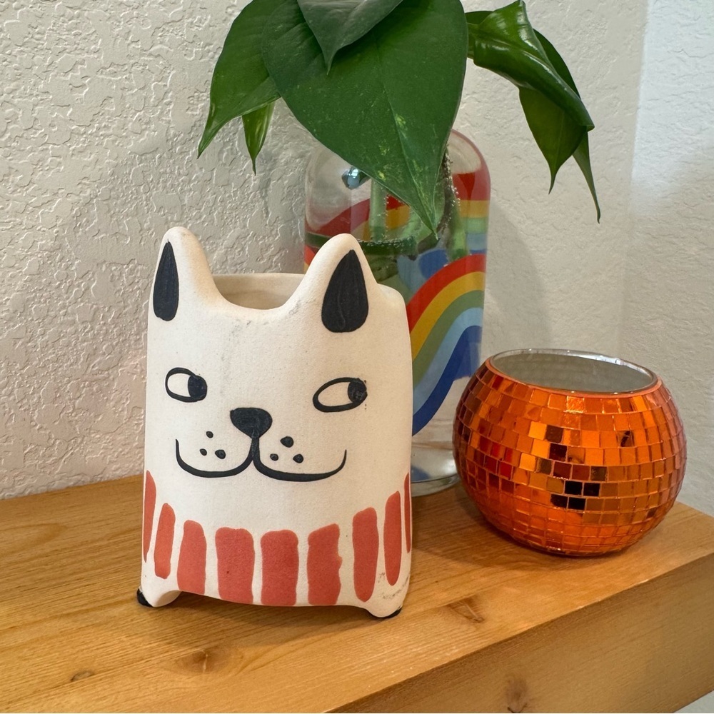 Cost is world market dog planter